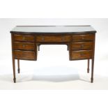 A mahogany bow front dressing table/small sideboard in the Sheraton style