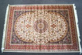 A green ground Keshan carpet,