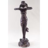 A bronze figure of a standing nymph,