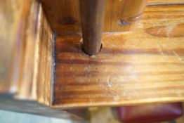 A Victorian pine pew with triple paneled back and prayer book shelf to the reverse (drilled hole)