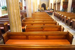 A Victorian pine pew with triple paneled back and prayer book shelf to the reverse 83cm high,