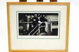 The Beatles, 16 x 12, Limited edition photograph, 30/49, of the group boarding a plane,