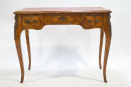 A Kingwood writing table, in the 18th century French style,