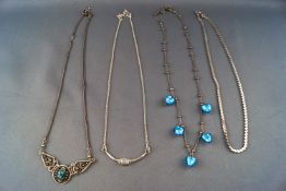 A collection of four necklaces of variable designs. All marked/assessed as sterling silver 925.