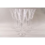 A set of six "Hookes" cut glass champagne glasses of flared form, boxed,