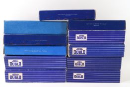 Eleven Hornby Dublo Corridor and Suburban Coaches, including D3, D12, D13, D14 and D21,