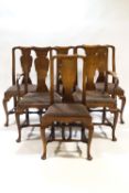 A set of six mahogany dining chairs on cabriole legs with turned stretchers