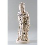 A Japanese Meiji period ivory and shibayama carved figure of a Geisha, seen standing holding a fan,