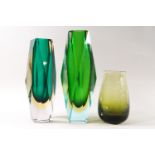 Two heavy cut and flashed green Studio glass vases and a Caithness one