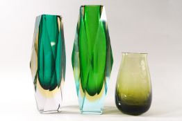 Two heavy cut and flashed green Studio glass vases and a Caithness one