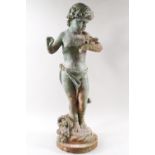 A cast metal garden figure of a cherub with butterfly,