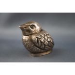 A white metal pepperette in the form of a chick, the base struck with Chinese marks,