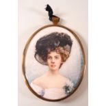 B Lock, A portrait miniature of an Edwardian lady, painted on ivory,