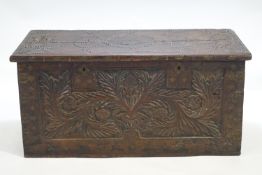 A carved hardwood South Arabian marriage chest of rectangular form,