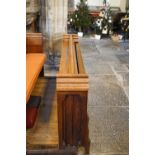 A Victorian pine pew front with prayer book shelf 83cm high, 177cm wide,