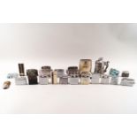 A collection of assorted table and pocket lighters,