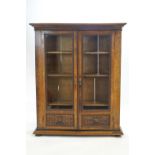 A 19th century walnut large glazed two door book/display cabinet ,