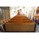 A Victorian pine pew with triple paneled back and prayer book shelf to the reverse 83cm high,