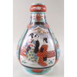A 19th century Japanese gourd shaped vase enamelled with courtly scenes, butterflies etc