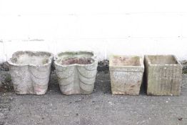 Two composition stone quatrefoil style garden urns and two others