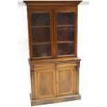 A Victorian mahogany bookcase with glazed top,