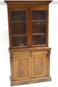 A Victorian mahogany bookcase with glazed top,