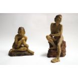 Ron Olley, A stoneware figure of a seated female nude, 36cm, and a similar one,