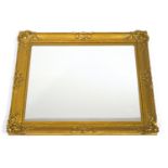 A Victorian rectangular picture frame, now with mirror glass,