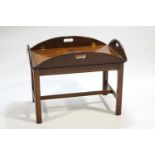 A mahogany period style butlers tray table, on a stand,