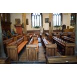 A Victorian pine pew with triple paneled back 83cm high, 278cm wide, 46.