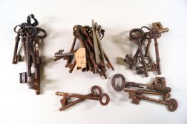 An assorted collection of mainly Georgian door keys etc