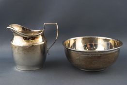 A silver cream jug and sugar bowl, of plain form, Birmingham 1925 and 1926,