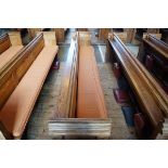 A Victorian pine pew with triple paneled back and prayer book shelf to the reverse (drilled hole)