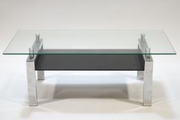 A rectangular glass and chrome coffee table,