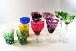 Seven flashed and cut glass hock glasses on tall stems and seven others