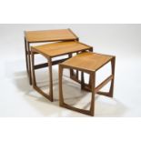 A group of 1960's G plan teak 'quadrille' nesting tables, the smallest bearing the label,