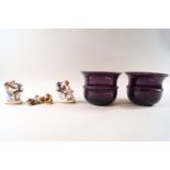 A pair of ribbed amethyst glass bowls,