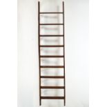 A set of plain form pine library steps with treads,