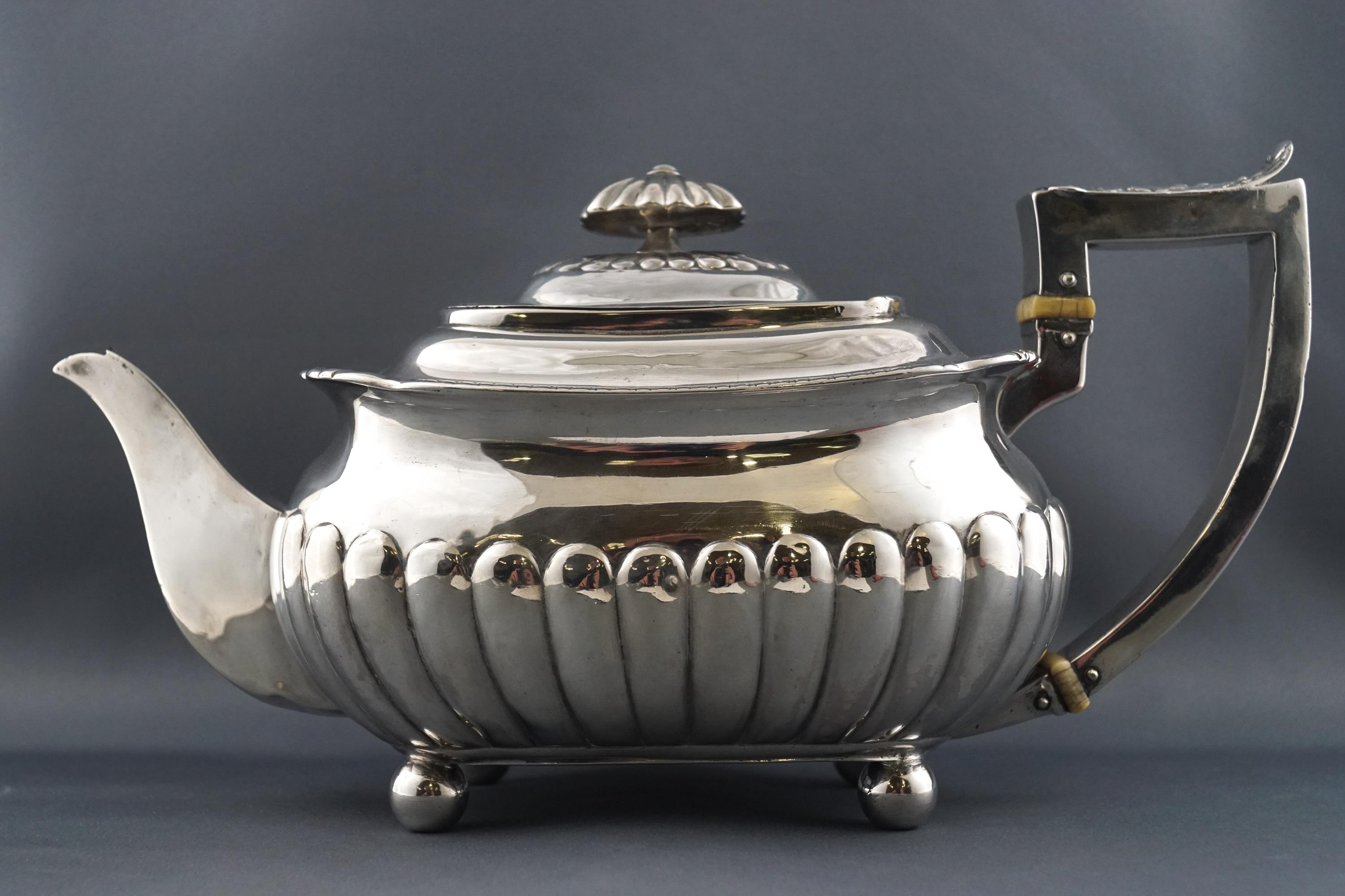 A Samuel Hennell teapot, of rounded rectangular form,