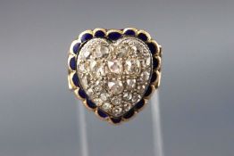 A yellow metal heart shaped ring set with twenty four old brilliant cut diamonds