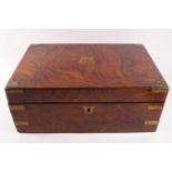 A 19th century walnut and brass bound writing slope with secret drawer section,