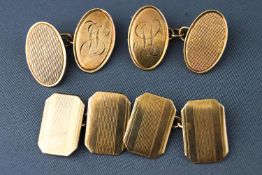 A collection of two pairs of yellow metal chain link cufflinks. Each pair hallmarked 9ct gold.