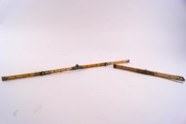 Two 19th century ivory and metal mounted rulers, one in four sections, 11 inches long,