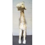 A large Merrythought giraffe with stitched label,