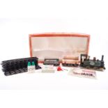 An RS1 Mamod boxed steam set comprising: one Mamod steam railway engine,