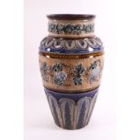A Royal Doulton stoneware vase, decorated by Emily Stomer with a floral band and leaf panels,