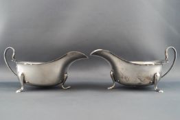A pair of small silver sauce boats,