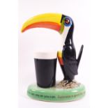 A Carlton ware Guinness toucan lamp, 21cm high,