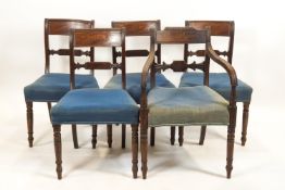 Four chairs and a carver in the Regency style