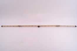 A 19th century ivory and brass mounted folding ruler by I Aston, London,